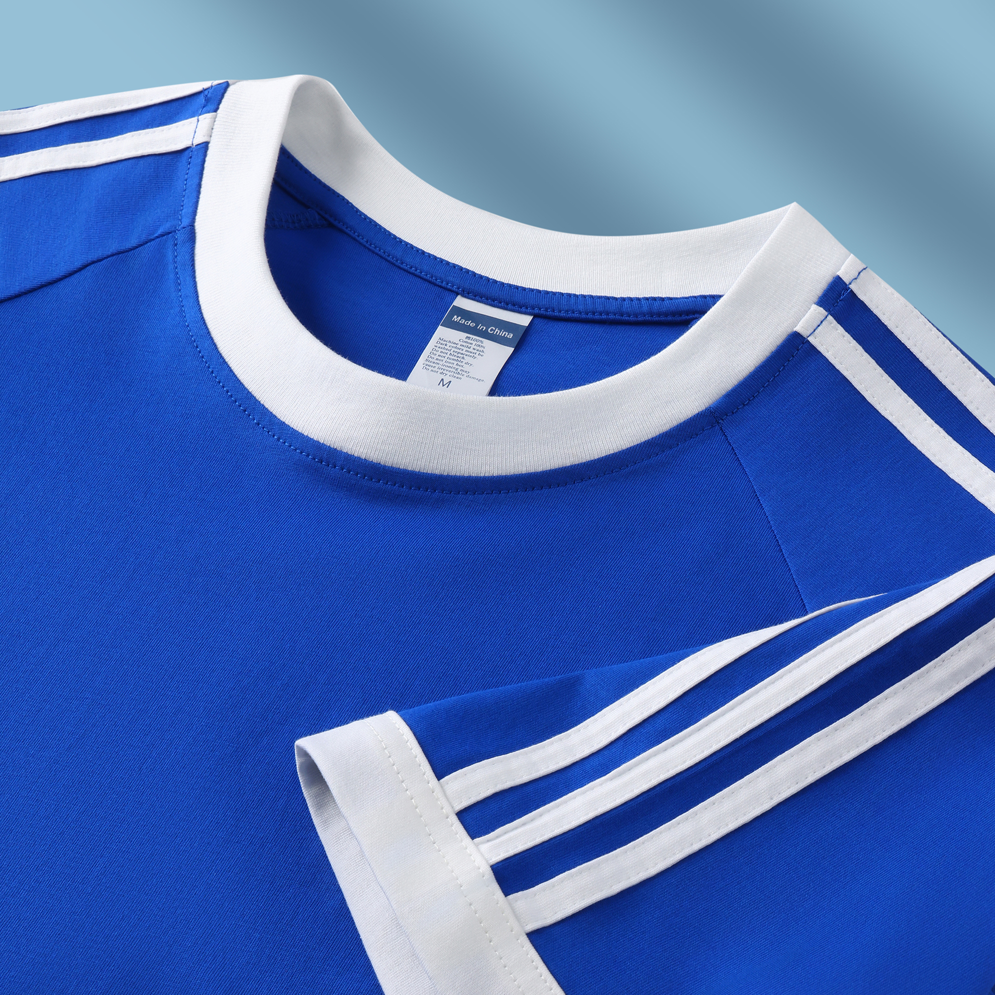 Contrast rib collar and shoulder stripes